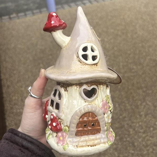 Beige mushroom house tea light