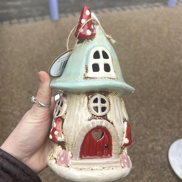 Blue mushroom house tea light